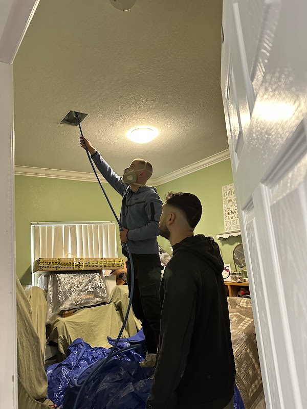 HVAC technician performing professional duct cleaning service